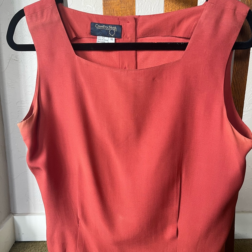 Sleeveless silk tank. Beautiful coral/rust colour.